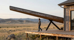 A Boomerang-Shaped Home Cantilevers Over The Wyoming Landscape